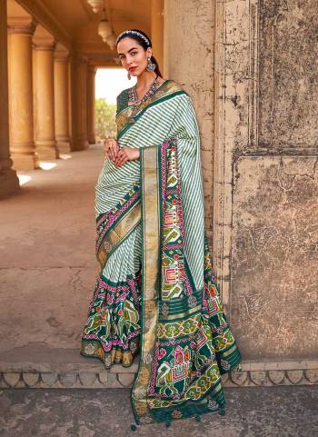 Buy These Beautiful Colored Saree pair With Blouse.These Saree And Blouse Are Fabricated On Patola Silk.Its Beautified With Weaving  Designer, Printed,Swarovski Work.