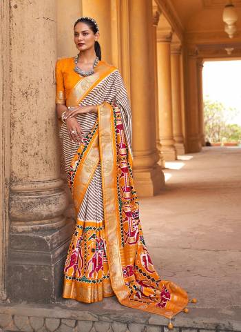 Buy These Beautiful Colored Saree pair With Blouse.These Saree And Blouse Are Fabricated On Patola Silk.Its Beautified With Weaving  Designer, Printed,Swarovski Work.