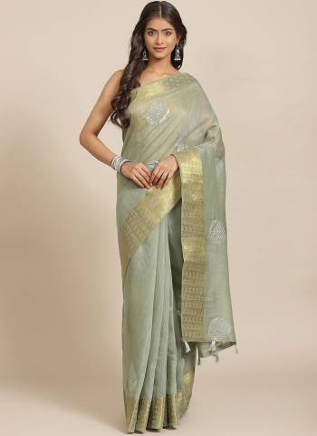 Garb These Saree in Fine Colored.These Saree is Fabricated On Cotton Blend Pair With Art Silk Blouse.Its Beautified With Printed And Sequance Work.