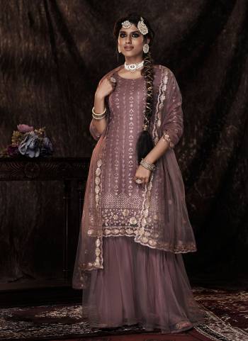 For A Beautiful Look,Grab These Sharara Suit in All Over Fine Colored.These Top And Bottom Are Fabricated On Soft Net Pair With Soft Net Dupatta.Its Beautified With Designer Sequance Embroidery Work.