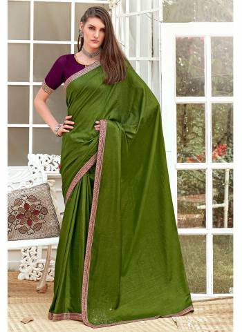 Grab These Casual Wear Saree in Fine Colored Pair With Contrasting Blouse.These Saree Is Fabricated On Vichitra Silk Pair With Art Silk Blouse.Its Beautified With Wevon Border,Swarovski Butta Designer Work.