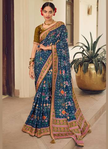 Grab These saree in Fine Colored.These Saree is Fabricated On Chinon Pair With Dupion Silk Blouse.Its Beautified With Designer Work.