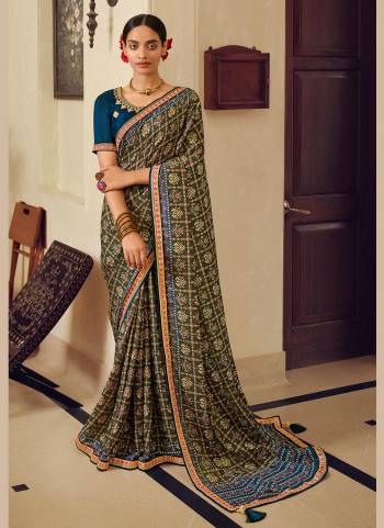 Grab These saree in Fine Colored.These Saree is Fabricated On Chinon Pair With Dupion Silk Blouse.Its Beautified With Designer Work.