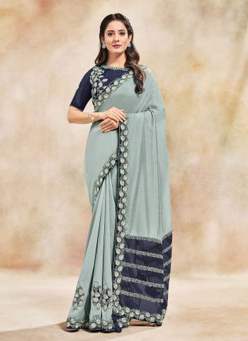 For A Different Look,Grab These Grab These Saree in Fine Colored.These Saree is Fabricated On Silk Georgette Pair With Raw Silk Blouse.Its Beautified With Designer Work.