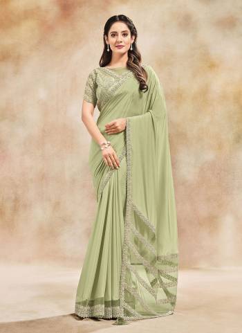 For A Different Look,Grab These Grab These Saree in Fine Colored.These Saree is Fabricated On Satin Silk Pair With Net and Satin Blouse.Its Beautified With Designer Work.