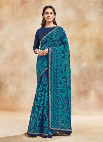 For A Different Look,Grab These Grab These Saree in Fine Colored.These Saree is Fabricated On Organza Pair With Silk Blouse.Its Beautified With Designer Work.