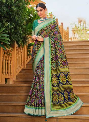 Grab These Beautiful Saree in Fine Colored.These Saree And Blouse Are Fabricated On Baraso Patola.its Beautified With  Woven Jari Designer And Patola Printed Work.