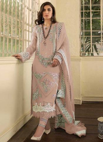 Grab These Suit in All Over Same Same Colored.These Top is Fabricated On Faux Georgette Pair With Santoon Bottom And Net Dupatta.Its Beautified With Heavy Designer Embroidery And Diamond Work.