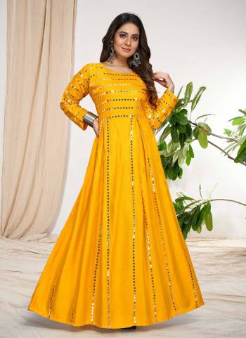 Grab These Readymade Gown in Fine Colored.These Gown is Fabricated On Rayon.Its Beautified With Designer Aari Work.