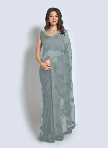 Grab These Saree in Fine Colored Pair With Blouse.These Saree is Fabricated On Georgette Pair With Banglori Silk Blouse.Its Beautified With Sequance,Thread Embroidery Work.