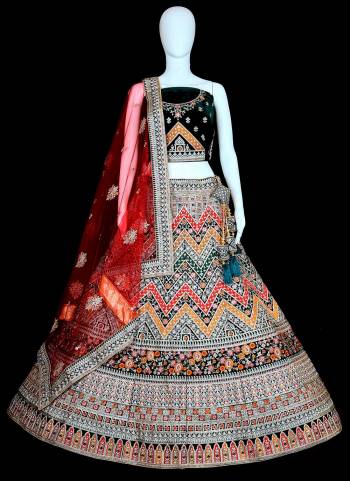 For A Beautiful Look,Grab These Designer Lehenga Choli in All Over Fine Colored.These Blouse And Lehenga Are Fabricated On Velvet Pair With Soft Net Blouse.Its Beautified With Heavy Designer Thread Embroidery Work.