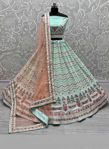 For A Designer Look,Grab These Beautiful Colored Lehenga Choli.These Lehenga And Blouse Are Fabricated On Georgette Pair With Soft Net Blouse.Its Beautified With Designer Thread,Sequance Embroidery Work.