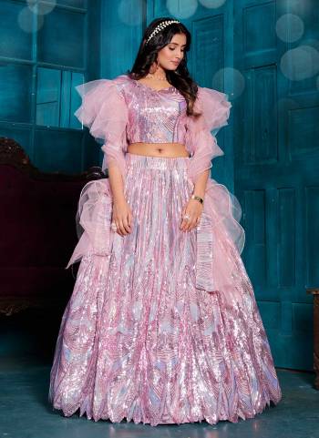 Grab These Fancy Designer Lehenga Choli in Fine Colored.These Lehenga And Blouse Are Fabricated On Net Pair With Net Dupatta.Its Beautified With Designer Sequance Embroidery Work.