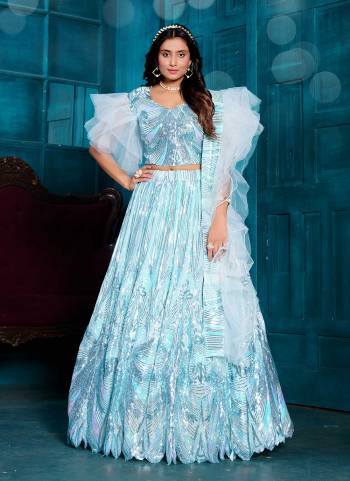 Grab These Fancy Designer Lehenga Choli in Fine Colored.These Lehenga And Blouse Are Fabricated On Net Pair With Net Dupatta.Its Beautified With Designer Sequance Embroidery Work.