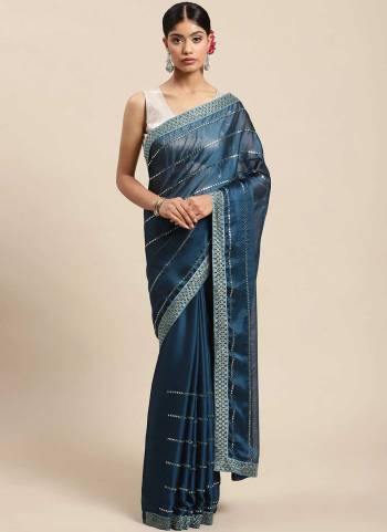 Grab These Beautiful Colored Saree Pair With Blouse.These Saree is Fabrcated On Chiffon Pair With Art Silk Blouse.Its Beautified With Mirror Embroidery Work.