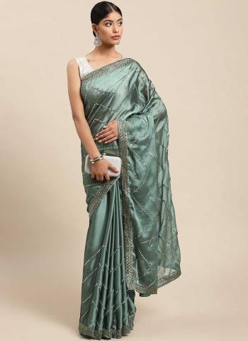 Grab These Beautiful Colored Saree Pair With Blouse.These Saree is Fabrcated On Chiffon Pair With Art Silk Blouse.Its Beautified With Mirror Embroidery Work.