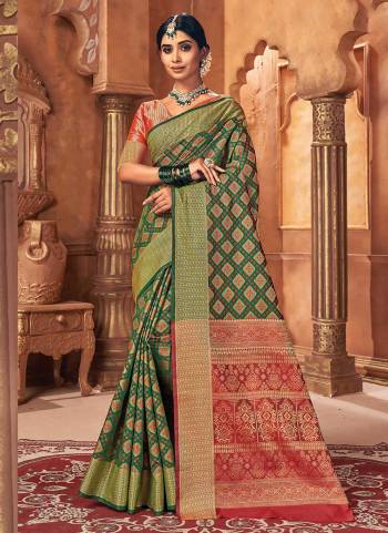 Grab These Saree in Fine Colored Pair With Blouse.These Saree And Blouse Are Fbaricated On Patola Silk.Its Beautified With Heavy Wevon Designer Work.