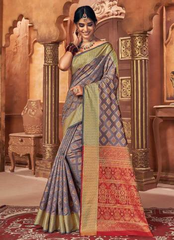 Grab These Saree in Fine Colored Pair With Blouse.These Saree And Blouse Are Fbaricated On Patola Silk.Its Beautified With Heavy Wevon Designer Work.