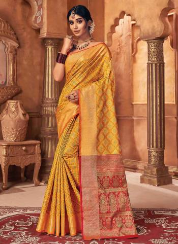 Grab These Saree in Fine Colored Pair With Blouse.These Saree And Blouse Are Fbaricated On Patola Silk.Its Beautified With Heavy Wevon Designer Work.