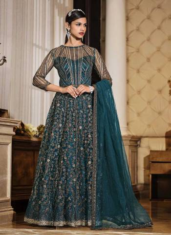 Grab These Fancy Suit in Fine Colored.These Top And Dupatta Are Fabricated On Soft Net Pair With Satin Bottom.Its Beautified With Heavy Multy Sequance Embroidery Work.