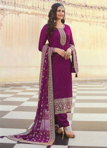 For A Designer Look,Grab These Beautiful Colored Suit Pair With Bottom And Dupatta.These Top is Fabricated On Dola Silk Pair With Santoon Bottom And Faux Georgette Dupatta.Its Beautified With Heavy Designer Embroidery And Swarovski Work.