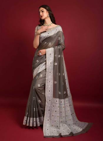 Grab These Saree in Fine Coored Pair With Blouse.These Saree And Blouse Are Fabricated On Art Silk.Its Beautified With Lucknowi Chikankari Wevon Designer Work.