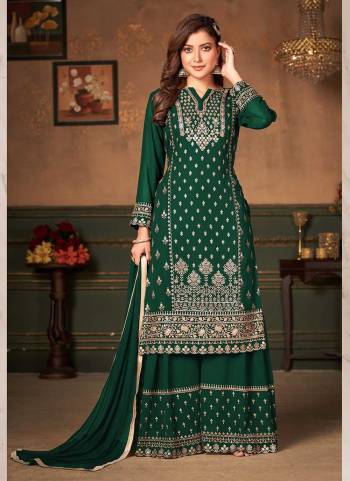 For A Designer Look,Grab These Sharara Suit in All Over Fine Colored.These Top And Bottom Are Fabricated On Faux Georgette Pair With Chiffon Dupatta.Its Beautified With Heavy Designer Embroidery Work.