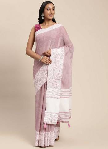 Grab These Saree in Fine Colored Pair With Blouse.These Saree And Blouse Are Fabricated On Linen.Its Beautified With Heavy Wevon Designer Work.