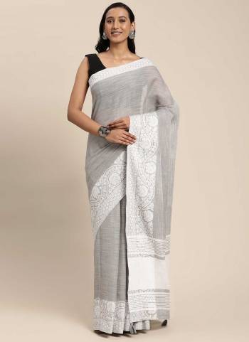 Grab These Saree in Fine Colored Pair With Blouse.These Saree And Blouse Are Fabricated On Linen.Its Beautified With Heavy Wevon Designer Work.