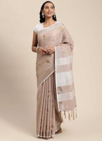 Grab These Saree in Fine Colored Pair With Blouse.These Saree And Blouse Are Fabricated On Linen.Its Beautified With Heavy Wevon Designer Work.