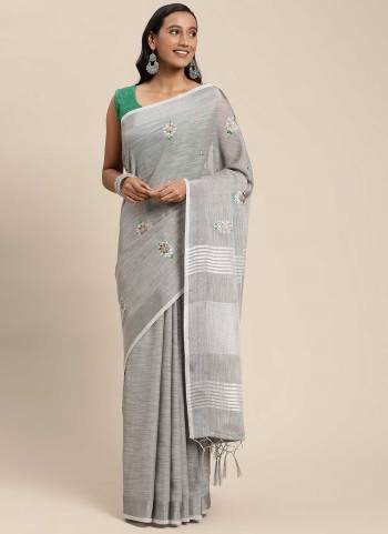 Grab These Saree in Fine Colored Pair With Blouse.These Saree And Blouse Are Fabricated On Linen.Its Beautified With Heavy Wevon Designer Work.