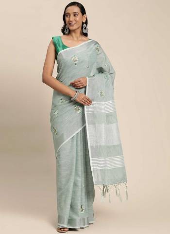 Grab These Saree in Fine Colored Pair With Blouse.These Saree And Blouse Are Fabricated On Linen.Its Beautified With Heavy Wevon Designer Work.