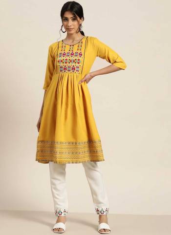 For A Different Look,Grab These Readymade pair in Fine Colored.These Kurti And Bottom Are Fabricated On Poly Cotton.Its Beautified With Designer Thread Embroidery Work.