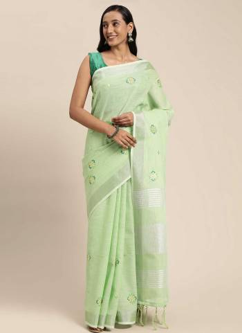 Grab These Beautiful Colored Saree Pair With Blouse.These Saree And Blouse Are Fabricated On Linen.its Beautified With  Wevon Pallu Border,Embroidery Work.