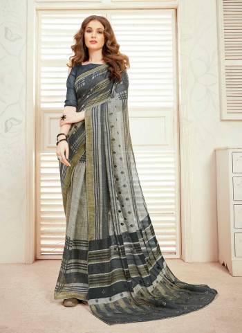 For A Different Looking Saree,Grab These Saree in Fine Colored Pair With Blouse.These Saree And Blouse Are Fabricated On Art Silk.its Beautified With Designer Work.