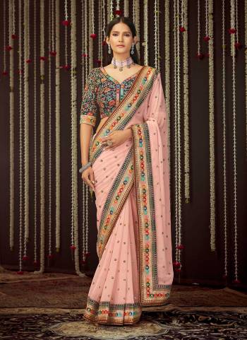 Grab These Saree in All Over Fine Colored Pair With Pretty Colored Blouse.These Saree is Fabricated On Art Silk Pair With Georgette Blouse.Its Beautified With Heavy Thread,Sequance Embroidery Work.