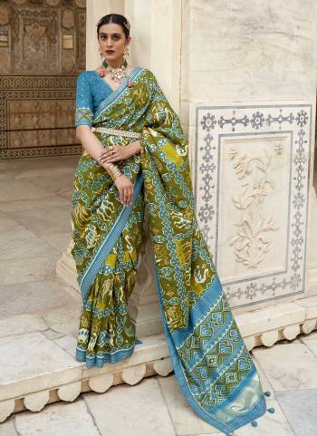 For A Beautiful Look,Grab These Saree in All Over Fine Colored.These Saree And Blouse Are Fabricated On Patola Silk.its Beautified With  Woven Jari Designer And Patola Printed Work.Buy Now.