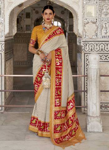 For A Beautiful Look,Grab These Saree in All Over Fine Colored.These Saree And Blouse Are Fabricated On Patola Silk.its Beautified With  Woven Jari Designer And Patola Printed Work.Buy Now.