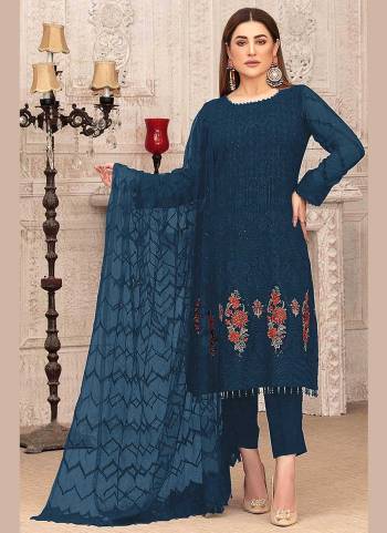 For A Beautiful Looking Suit Pair With Bottom And Dupatta.These Top is Fabricated On Georgette Pair With Santoon Bottom And Nazmin Dupatt.its Beautified With Heavy Designer Sequance Embroidery Work. 