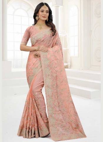 Grab These Saree in Fine Colored Pair With Matching Colored Blouse.These Saree And Blouse Are Fabricated On Organza.its Beautified With Designer Work.