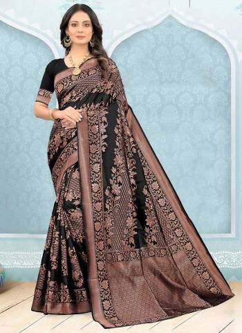 Grab These Black Colored Saree Pair With Black Colored Blouse.These Saree And Blouse Are Fabricated On Litchi Silk.Its Beautified With Heavy Jari Wevon Designer Work.