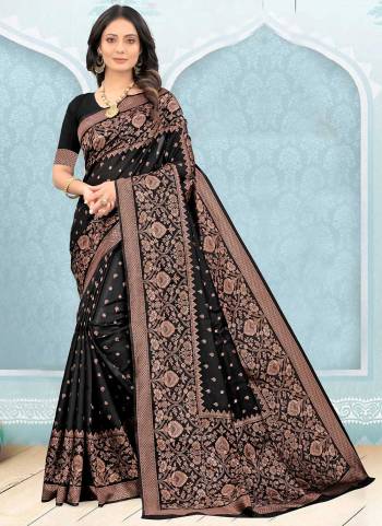 Grab These Black Colored Saree Pair With Black Colored Blouse.These Saree And Blouse Are Fabricated On Litchi Silk.Its Beautified With Heavy Jari Wevon Designer Work.