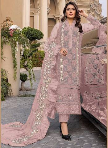 Grab These Semi Stiched Suit in All Over Fine Colored,These Top is Fabricated On Georgette Pair With Santoon Bottom And Nazmin Dupatta.Its Beautified With Heavy Designer Sequance Embroidery Work.