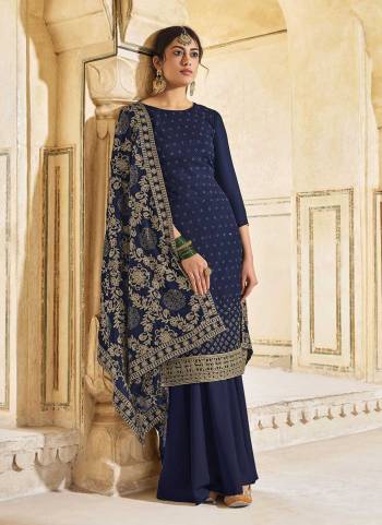 For A Designer Look,Grab These Plazzo Suit in All Over Fine Colored.These Top is Fabricated On Georgette Pair With Santoon Bottom And Georgette Dupatta.Its Beautified With Embroidery Work.