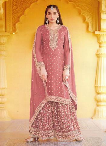 Grab These Beautiful Colored Plazzo Suit.These Top and Bottom Are Fabricated On Faux Georgette Pair With Faux Georgette Dupatta.Its Beautified With Heavy Designer Embroidery Work