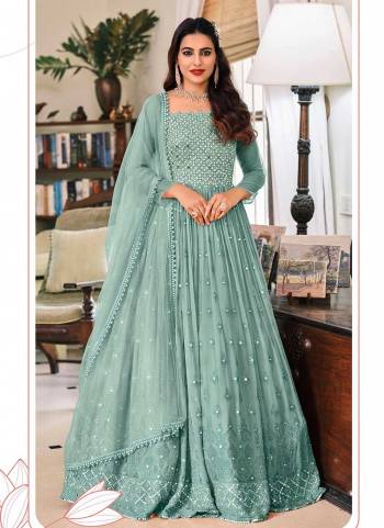 Grab These Very Pretty Colored Suit Pair With Dupatta And Bottom.These Top And Bottom Are Fabricated On Faux Georgette Pair With Soft Net Dupatta.Its Beautified With  Designer Heavy Mirror Embroidery Work.