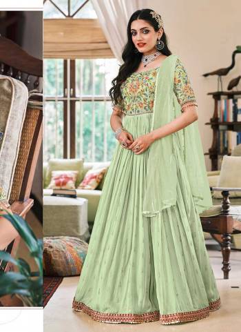 Grab These Very Pretty Colored Suit Pair With Dupatta And Bottom.These Top And Bottom Are Fabricated On Faux Georgette Pair With Soft Net Dupatta.Its Beautified With  Designer Heavy Mirror Embroidery Work.