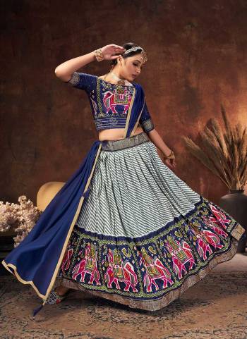 Grab These Beautiful Colored Lehenga Choli Pair With Designer Blouse And Dupatta.These Lehenga And Blouse Are Fabricated On Velvet Tussar Silk Pair With Velvet Tussar Silk Dupatta.Its Beautified With Digital Patola Printed And Swarovski Work.