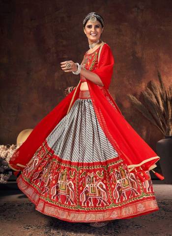 Grab These Beautiful Colored Lehenga Choli Pair With Designer Blouse And Dupatta.These Lehenga And Blouse Are Fabricated On Velvet Tussar Silk Pair With Velvet Tussar Silk Dupatta.Its Beautified With Digital Patola Printed And Swarovski Work.