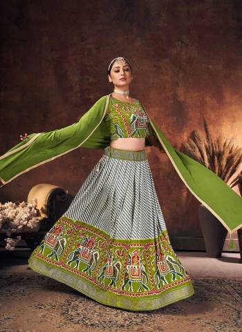 Grab These Beautiful Colored Lehenga Choli Pair With Designer Blouse And Dupatta.These Lehenga And Blouse Are Fabricated On Velvet Tussar Silk Pair With Velvet Tussar Silk Dupatta.Its Beautified With Digital Patola Printed And Swarovski Work.